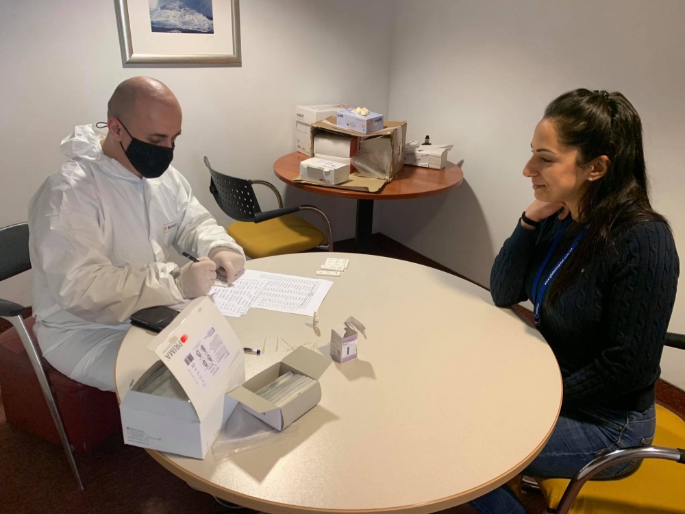 GlobalCapital screening staff with rapid COVID-19 test kit