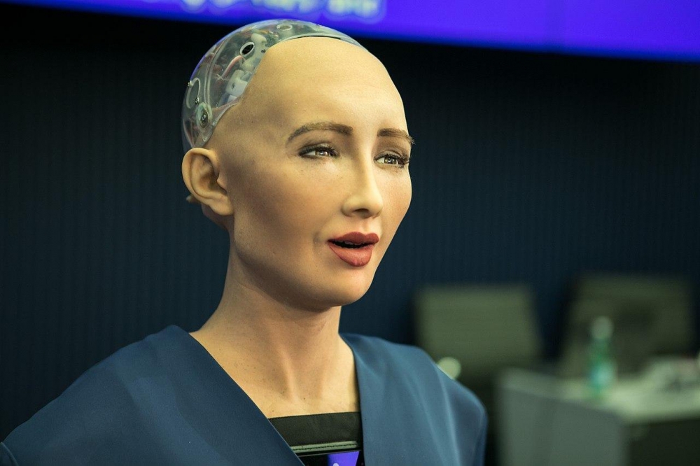 An epitaph to Sophia the robot dancing the Blockchain dream