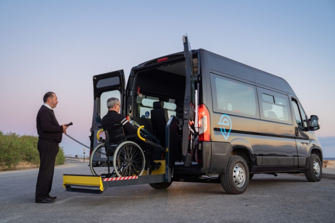 Free wheelchair transport service for eligible persons needing hospital visits