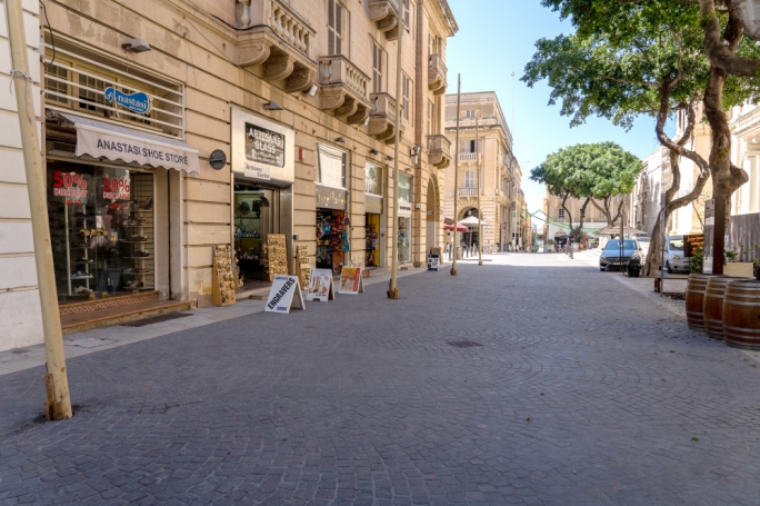 Businesses are open during normal working hours, but there are few shoppers or patrons to be found