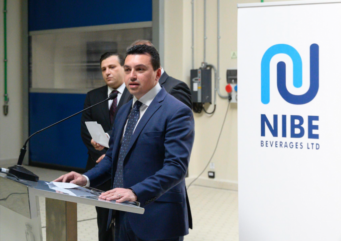 Parliamentary Secretary Aaron Farrugia and Minister Chris Cardona through the premises. Above: Aaron Farrugia addressing media and employees