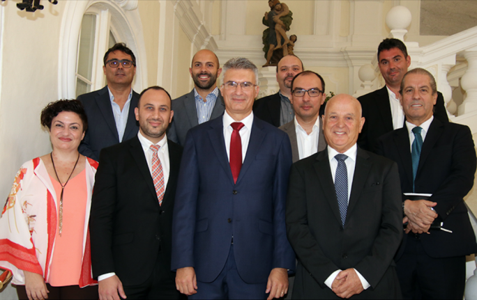 Minister Carmelo Abela (front, centre) with members of the Malta-Japan Chamber of Commerce